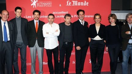 Des lauréats de grands prix littéraires réunis au salon du livre du Touquet, novembre 2013 : de gauche à droite, Daniel Fasquelle, Alexandre Postel, Mael Renouard ,Yann Moix, Pierre Lemaitre, Thomas Reverdy, Julie Bonnie, Monica Sabolo et Sorj Chalandon, le 21 novembre 2013 au Touquet
 (FRANCOIS LO PRESTI / AFP)