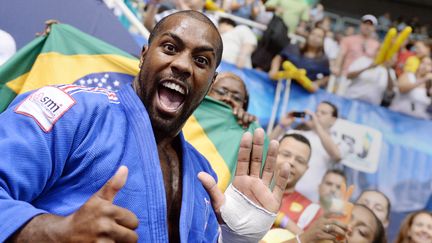 La ruée vers l'or. Champion olympique aux Jeux de Londres en 2012, le judoka français s'offre un sixième sacre mondial, le 31 août 2013, à Rio de Janeiro (Brésil). (PHILIPPE MILLEREAU / AFP)