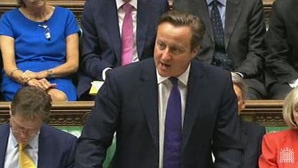 Le Premier ministre britannique, David Cameron, le 26 septembre 2014 au Parlement &agrave; Londres (Royaume-Uni). (PARLIAMENT TV / AFP)