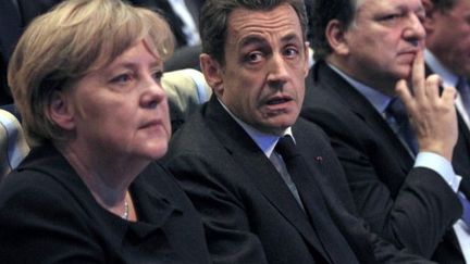 Angela Merkel et Nicolas Sarkozy lors d'un sommet européen en 2011 (JEAN-PAUL PELISSIER / POOL / AFP)