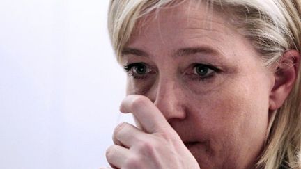 Marine Le Pen en conférence de presse le 27 mars (AFP PHOTO KENZO TRIBOUILLARD)