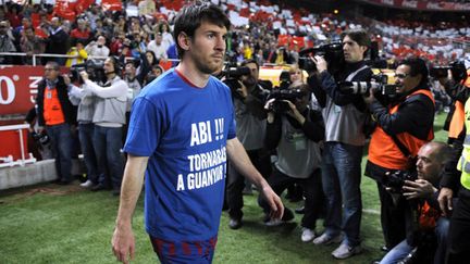 Lionel Messi avec un t-shirt en soutien à "Abi", son coéquipier Eric Abidal