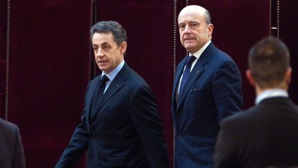 Nicolas Sarkozy et Alain Jupp&eacute; &agrave; l'Elys&eacute;e, le 20 janvier 2012. (CHARLES PLATIAU / AFP)