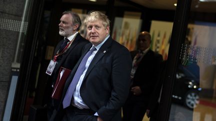 Le premier ministre britannique Boris Johnson quitte un sommet de l'Union Europénne, à Bruxelles, le 18 octobre 2019.&nbsp; (KENZO TRIBOUILLARD / AFP)