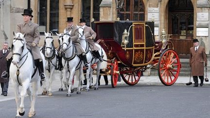 Le carrosse a participé à la répétition du cortège royal mercredi soir (AFP - Carl Court)