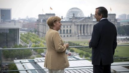 A.Merkel et A.Samaras devant le Bundestag. L'Allemagne accordera-t-elle un délai à la Grèce ? (GUIDO BERGMANN / BUNDESREGIERUNG / AFP)