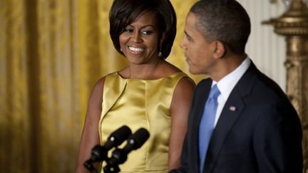 Michelle Obama, avec son époux, Barack, le 5 octobre 2010 à la Maison blanche (AFP - Jim WATSON)