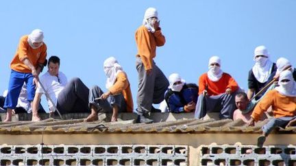 Des détenus de la prison de Cascavel, au Brésil, ont pris deux gardes en otages. (AFP PHOTO / MARCELINO DUARTE)