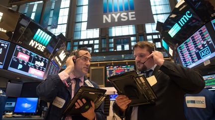 Des traders de la bourse de New York, le 6 mars 2017. (BRYAN R. SMITH / AFP)