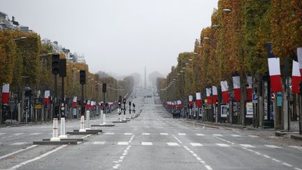 L'avenue des Champs-Elysées vide lors de la cérémonie du 11 novembre en 2020. (YOAN VALAT / AFP)