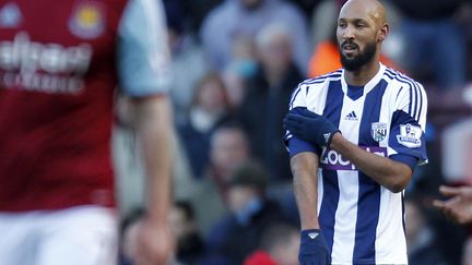 Nicolas Anelka c&eacute;l&egrave;bre un but avec une "quenelle", &agrave; Londres, le 28 d&eacute;cembre 2013. (IAN KINGTON / AFP)