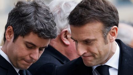 Gabriel Attal and Emmanuel Macron, during the tribute to Robert Badinter, February 9, 2024, in Paris.  (LUDOVIC MARIN / AFP)