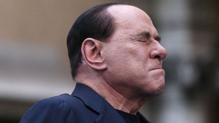 L'ancien président du Conseil italien Silvio Berlusconi pendant un meeting de protestation contre sa condamnation pour fraude fiscale, le 4-8-2013 à Rome. (Reuters - Alessandro Bianchi )