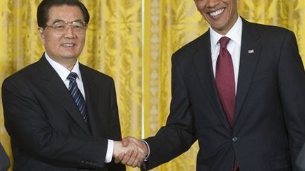 Barack Obama et Hu Jintao lors de leur conférence de presse commune, à Washington, le 19 janvier 2011 (AFP PHOTO / Saul LOEB)