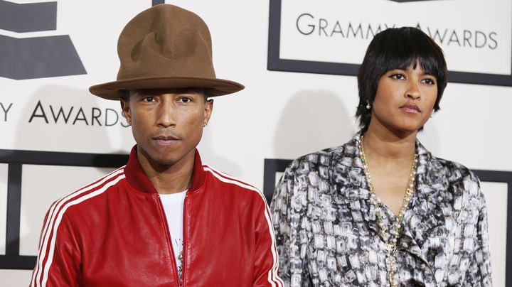 Pharrell Williams et sa femme arrivent aux 56es Grammy Awards &agrave; Los Angeles (Etats-Unis), le 26 janvier 2014. (DANNY MOLOSHOK / REUTERS)