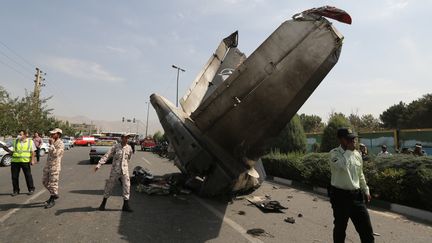 L'avion s'est &eacute;cras&eacute; pr&egrave;s de l'a&eacute;roport Mehrabad de T&eacute;h&eacute;ran, le 10 ao&ucirc;t 2014. (ATTA KENARE / AFP)