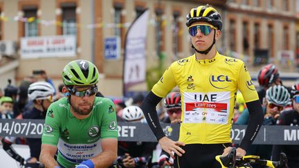 Mark Cavendish (à gauche) et Tadej Pogacar, acteurs principaux du Tour de France 2021.&nbsp; (THOMAS SAMSON / AFP)