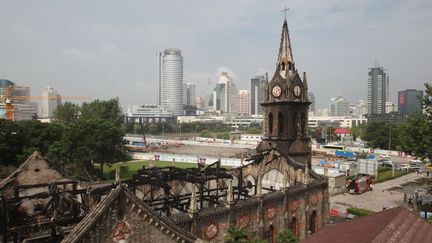 La cathédrale Jiangbei en Chine ravagée par un incendie, juillet 2014
 (JIA DONGLIU / IMAGINECHINA)