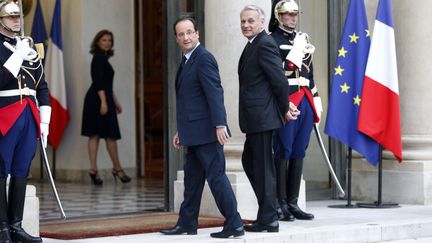 Le pr&eacute;sident Fran&ccedil;ois Hollande et le Premier ministre Jean-Marc Ayrault, au palais de l'Elys&eacute;e, le 26 juin 2012. (CHESNOT / SIPA)