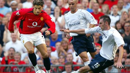 Cristiano Ronaldo lors de son premier match sous les couleurs de Red Devils en 2003. (ADRIAN DENNIS / AFP)