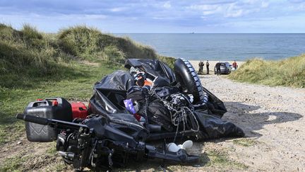 A migrant boat damaged after the death of eight people in a shipwreck near Ambleteuse beach (Pas-de-Calais), September 15, 2024. (BERNARD BARRON / AFP)