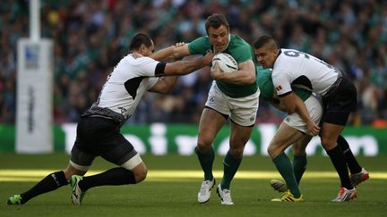 Tommy Bowe échappe aux placages roumains (ADRIAN DENNIS / AFP)