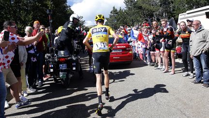 Le Britannique Christopher Froome court&nbsp;lors de la 12e étape du tour de France, jeudi 14 juillet 2016.&nbsp; (JEAN-PAUL PELISSIER / REUTERS)