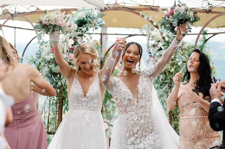 Footballers Sarah Puntigam and Genesee Daughetee at their wedding in June 2022. (Rokolya Photography)