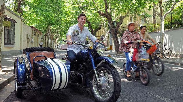 &nbsp; (A Shanghai, les side-cars se mélangent aux cyclomoteurs © DR)