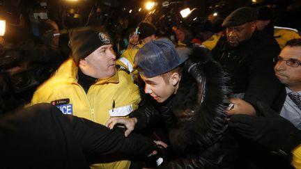 Le chanteur Justin Bieber arrive au commissariat de Toronto (Canada), le 29 janvier 2014. ( REUTERS)