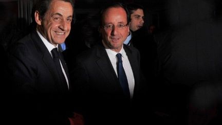 Nicolas Sarkozy et François Hollande lors du dîner du Crif mercredi 8 février (AFP PHOTO PHOTO / CHRISTOPHE GUIBBAUD)