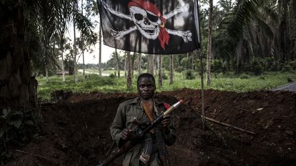 Lors de leurs expéditions nocturnes, les miliciens de l'Allied democratic Forces (ADF) tuent civils et des militaires à l'arme blanche par centaines. Les ADF sont tenus responsables de la mort de 15 Casques bleus tanzaniens en décembre 2017 à Semuliki, près de la frontière avec l'Ouganda. Ils attaquent également régulièrement des positions de l'armée congolaise, en quête d'armes, de munitions et de matériel médical. (JOHN WESSELS / AFP)