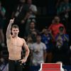 Le Français Léon Marchand peut savourer : vainqueur du 200 m brasse, il vient de remporter son troisième titre olympique, le deuxième de sa soirée, dans une Paris La Défense Arena en fusion, le 31 juillet 2024. (JONATHAN NACKSTRAND / AFP)