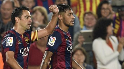 Xavi et Neymar (Barcelone) (LLUIS GENE / AFP)