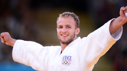 Le judoka Ugo Legrand f&ecirc;te sa m&eacute;daille de bronze, le 30 juillet 2012 &agrave; Londres. (FRANCK FIFE / AFP)