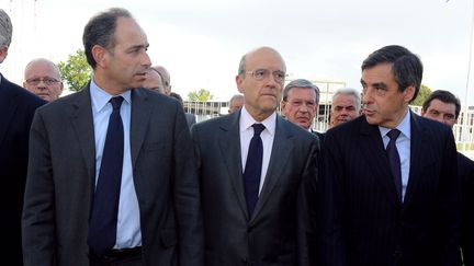 Jean-Fran&ccedil;ois Cop&eacute;, Alain Jupp&eacute; et Fran&ccedil;ois Fillon arrivent &agrave; Bordeaux pour un meeting commun, le 3 mai 2012. (JEAN-PIERRE MULLER / AFP)