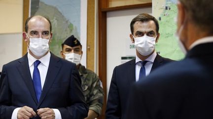 Le Premier ministre Jean Castex et le ministre de la Santé Olivier sont en déplacement en Guyane, le 12 juillet, pour faire le point sur la situation sanitaire.&nbsp; (JODY AMIET / AFP)