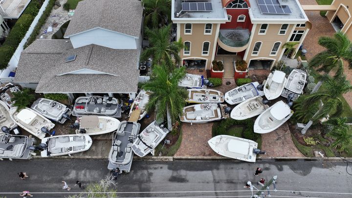 Aerial view of boats stacked in front of homes along the shores of Treasure Island, Florida, September 28, 2024. (JOE RAEDLE/GETTY IMAGES NORTH AMERICA)