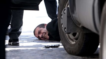 Le tireur pr&eacute;sum&eacute; &agrave; l'origine de la fusillade qui a &eacute;clat&eacute; devant le palais Chigi, &agrave; Rome (Italie), le 28 avril 2013. (MAURO SCROBOGNA / AP / SIPA)