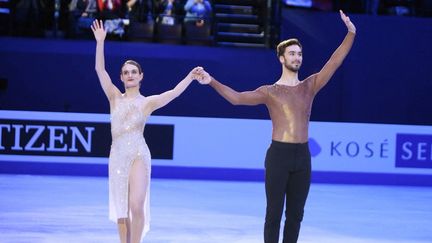 Gabriella Papadakis et Guillaume Cizeron après leur passage lors du programme libre des championnats du monde de patinage artistique, le 26 mars 2022, à Montpellier.&nbsp; (LAURENT LAIRYS / DPPI via AFP)