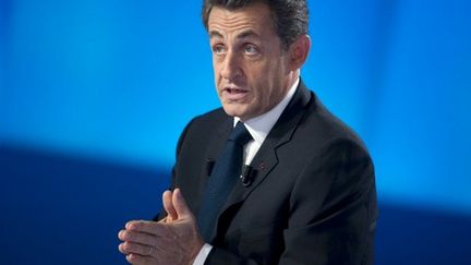 Nicolas Sarkozy, sur le plateau du Grand journal. (LIONEL BONAVENTURE / POOL / AFP)