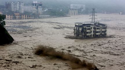 De violentes inondations ravagent la ville de Beichuan (Chine), le 9 juillet 2013. (AFP)