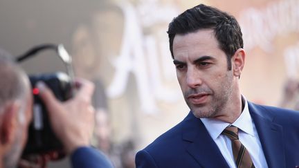 L'acteur et humoriste britannique Sacha Baron Cohen lors de l'avant-première d'"Alice de l'autre côté du miroir" le 23 mai 2016, à Hollywood (États-Unis). (TOMMASO BODDI / WIREIMAGE)