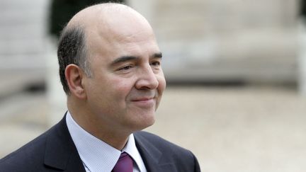 Pierre Moscovici, ministre de l'Economie, &agrave; l'Elys&eacute;e, &agrave; Paris, le 13 f&eacute;vrier 2013. (PATRICK KOVARIK / AFP)