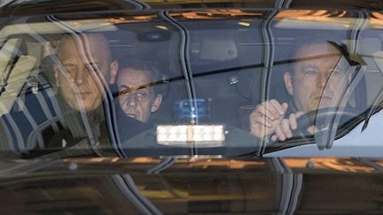 L'ancien président Nicolas Sarkozy arrive au Pôle financier du palais de justice de Paris, le 16 février 2016. (THOMAS SAMSON / AFP)