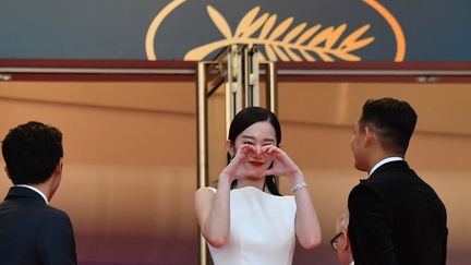 Des luttes, du cinéma et un peu d'amour. L'actrice sud-coréenne Jun Jong-seo à l'affiche du film "Burning" de Lee Chang Dong (compétition officielle) déclare sa flamme à la Croisette.
 (ALBERTO PIZZOLI / AFP)