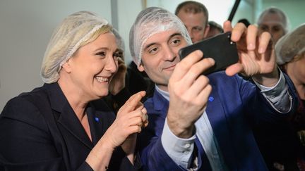 Marine Le Pen et Florian Philippot le 8 mars 2017 à Chalezeule (Doubs).&nbsp; (SEBASTIEN BOZON / AFP)