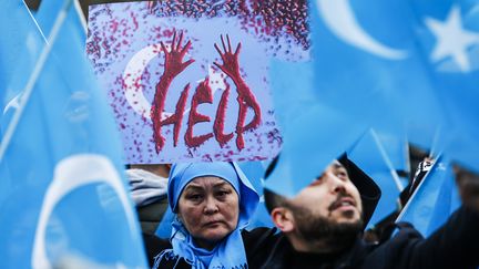 Lors d'une manifestation de soutien à la communauté ouïghoure, le 27 décembre 2019, à Berlin (Allemagne).&nbsp; (ABDULHAMID HOSBAS / ANADOLU AGENCY / AFP)