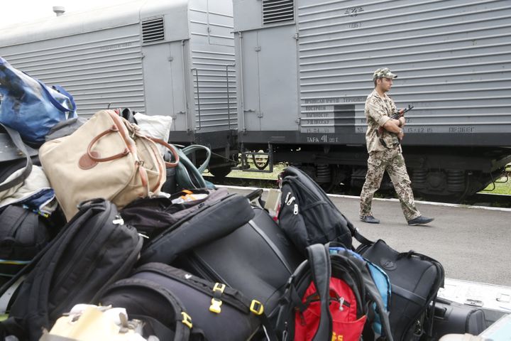 &nbsp; (Le train transportant les corps des victimes avant son départ de Torez © REUTERS / Maxim Zmeyev)