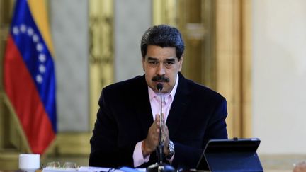 Le président vénézuélien, Nicolas Maduro, lors d'une allocution télévisée dans son palais à Caracas, le 26 mars 2020. (JHONN ZERPA / VENEZUELAN PRESIDENCY / AFP)